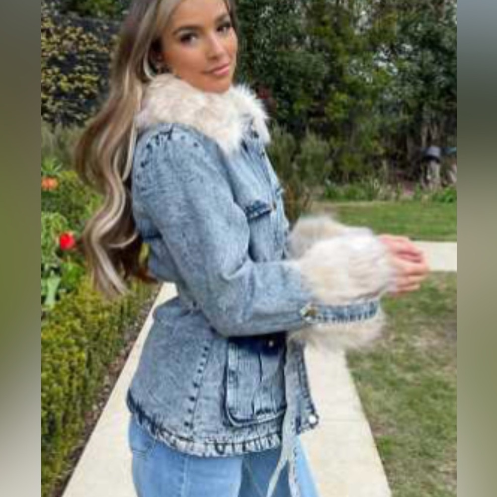 Parisian Jean jacket w/ faux fur trim on cuff & collar. Acid washed,zip & button